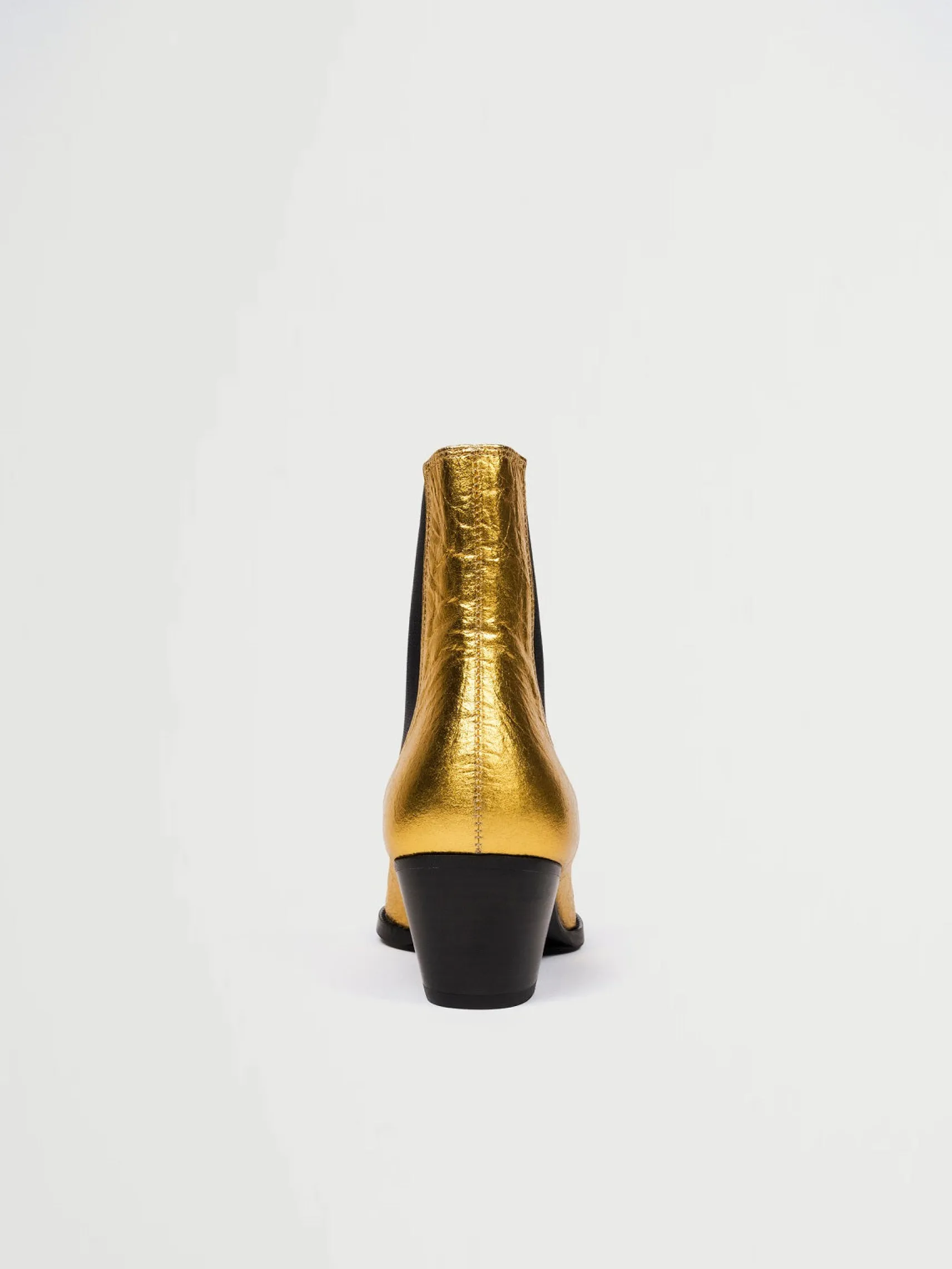 goldene_vegane_lederstief_2.webp Goldene vegane Lederstiefel