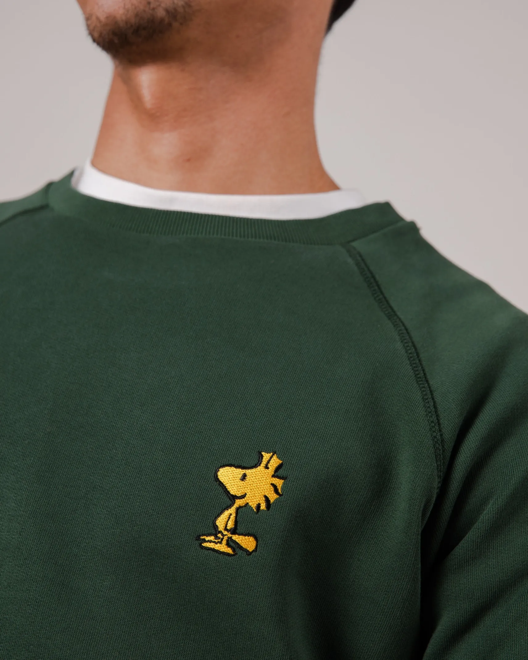 grnes_herrensweatshirt_pe_2.webp Grünes Herren-Sweatshirt Peanuts