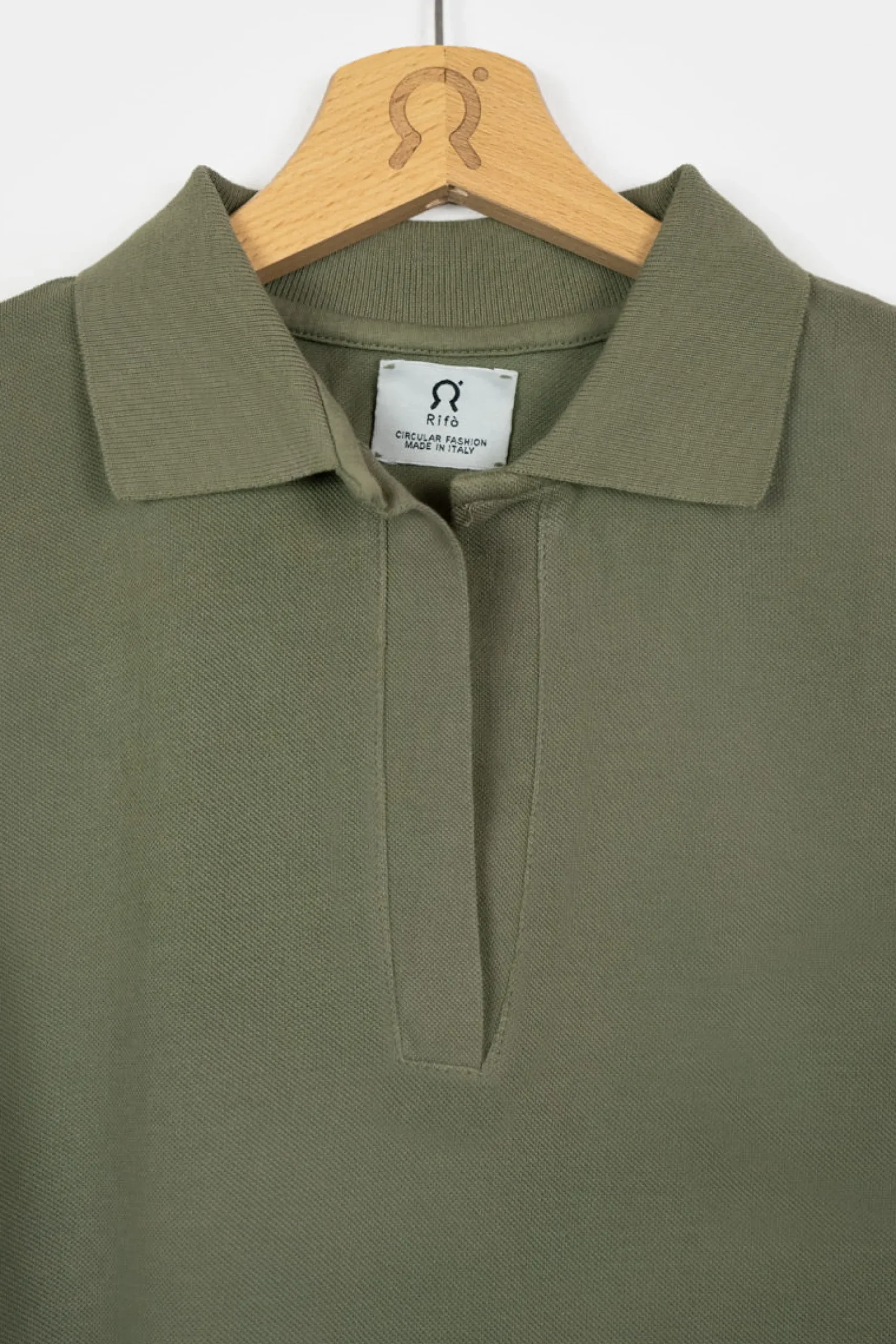 rmelloses_poloshirt_helen_1.webp Ärmelloses Poloshirt Helen Grün