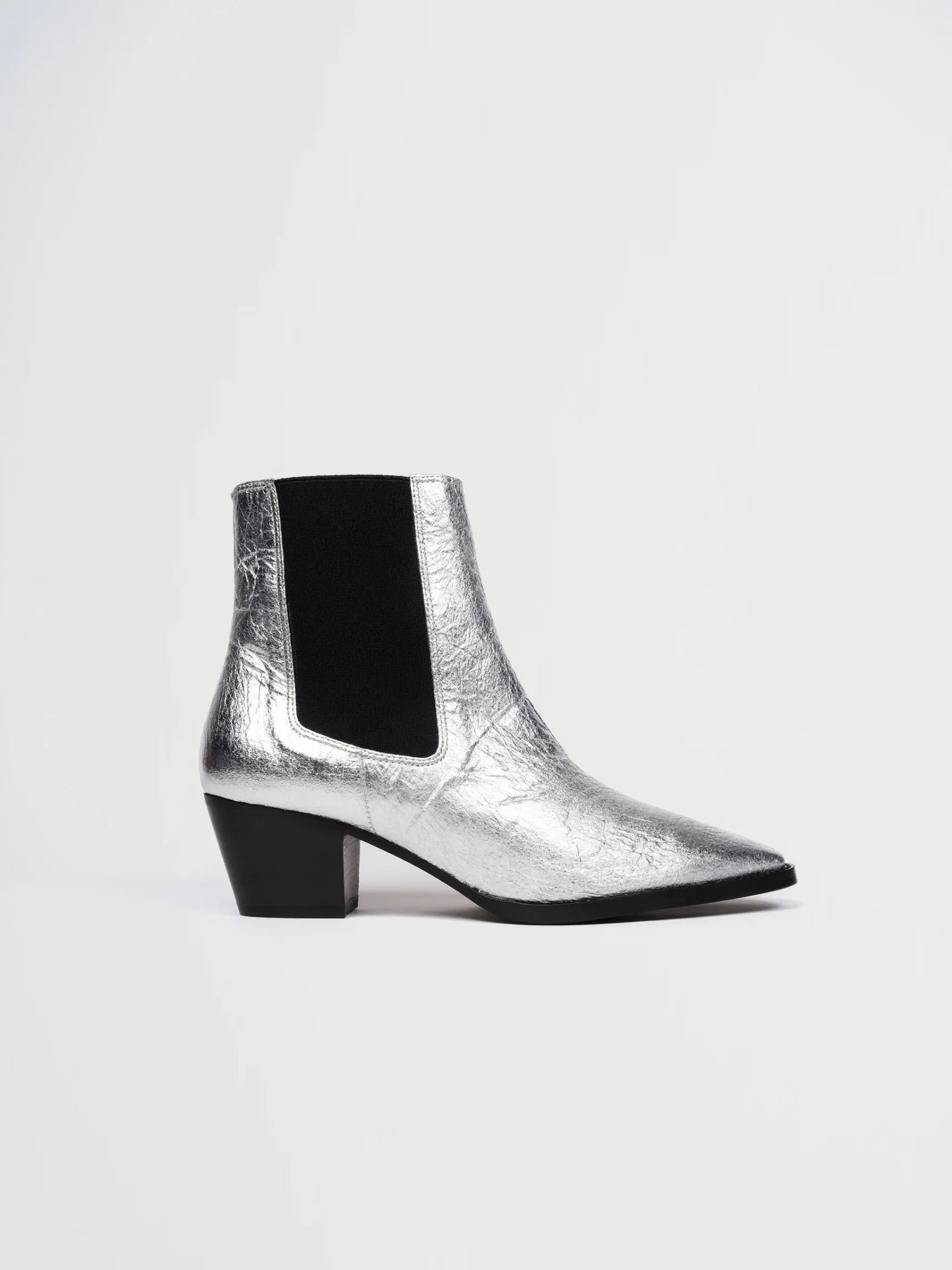 silberne_vegane_lederstie_0.webp Silberne vegane Lederstiefel