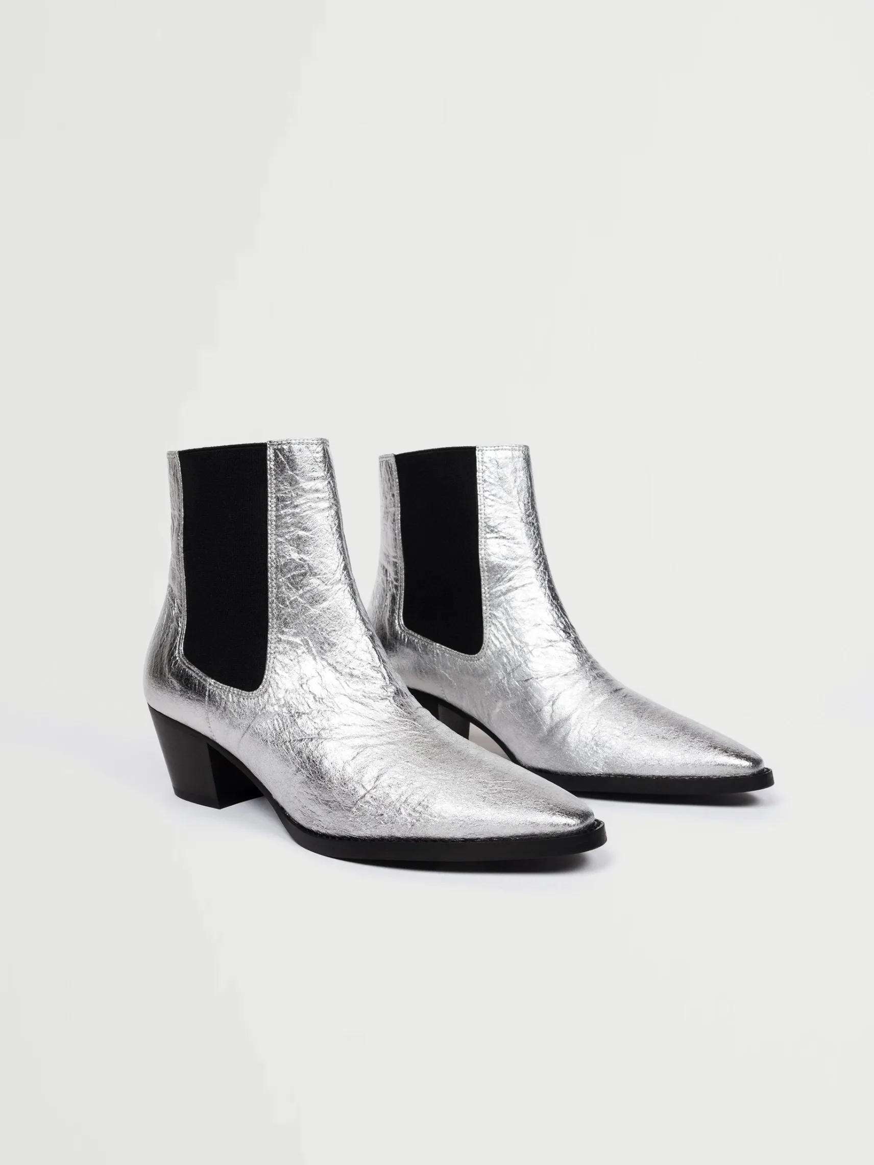 silberne_vegane_lederstie_1.webp Silberne vegane Lederstiefel