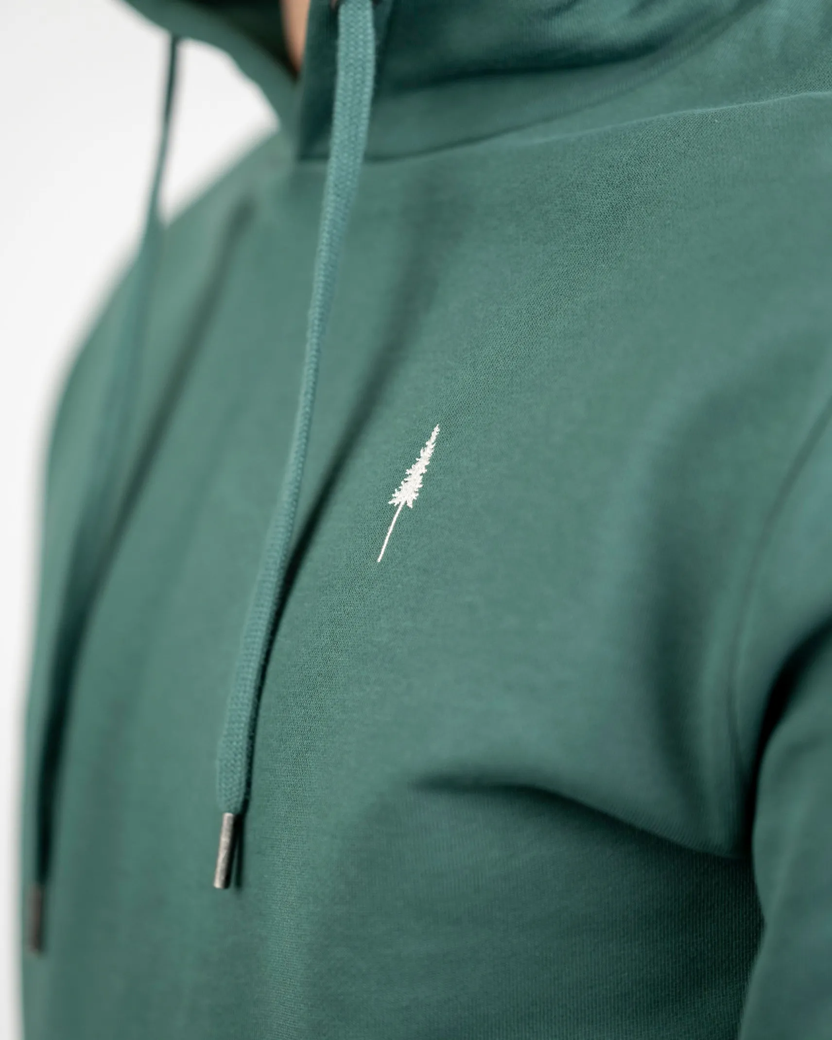 unisex_hoodie_aus_biobaum_2.webp Unisex Hoodie aus Bio-Baumwolle TreeHoodie Pine Green